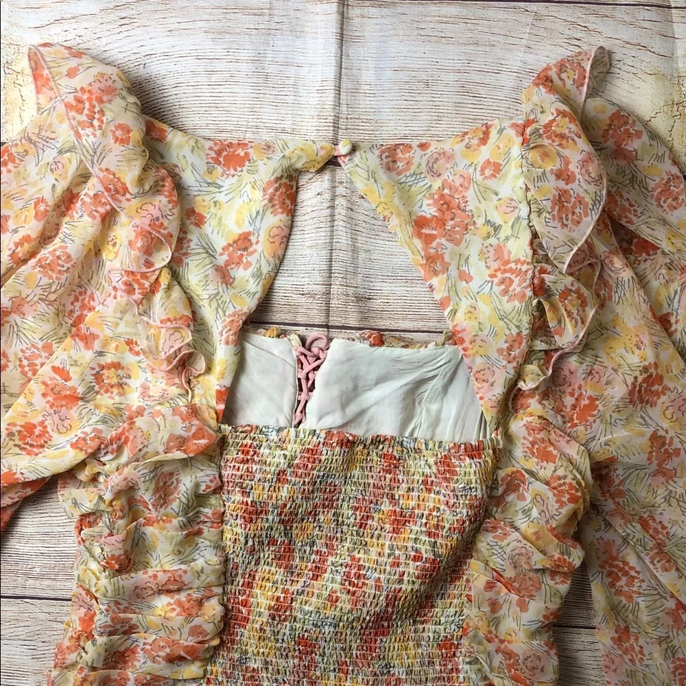 Free People Mabel Fairy Sheet printed ruched‎ blouse with a floral pattern